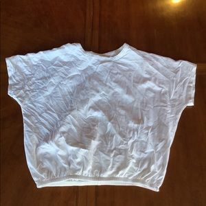 white top with scrunch at the bottom